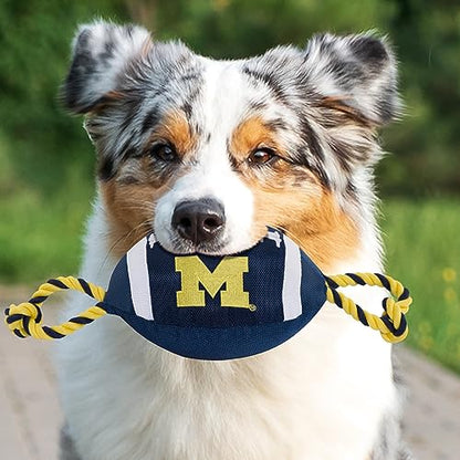 Pets First NCAA Michigan Wolverines Football Dog Toy, Tough Quality Nylon Materials, Strong Pull Ropes, Inner Squeaker, Collegiate Team Color, 1 Count (Pack of 1) - color: Michigan Wolverines